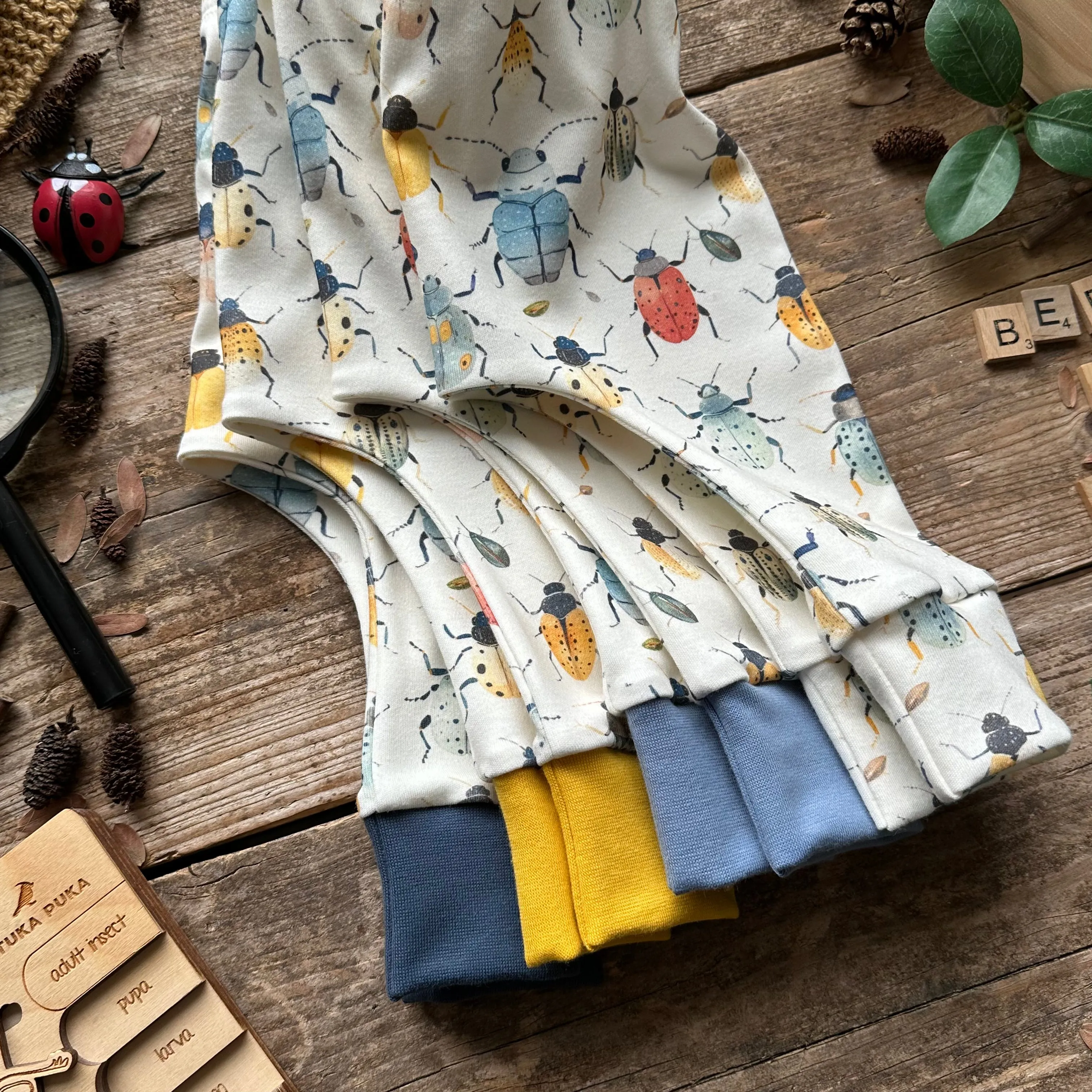 Beetles   Bugs Footed Romper