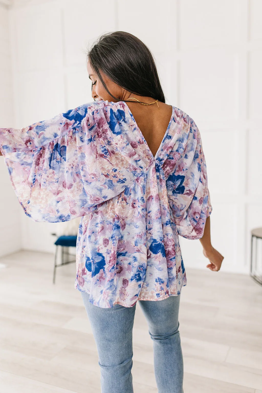 Fabled in Floral Draped Peplum Top