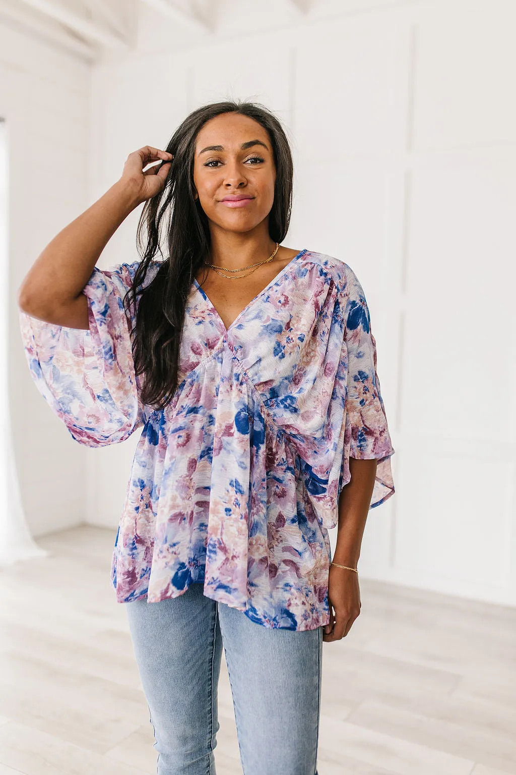 Fabled in Floral Draped Peplum Top