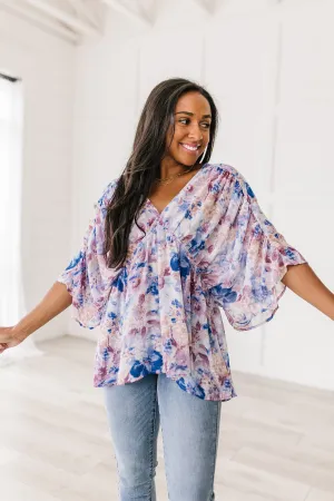 Fabled in Floral Draped Peplum Top